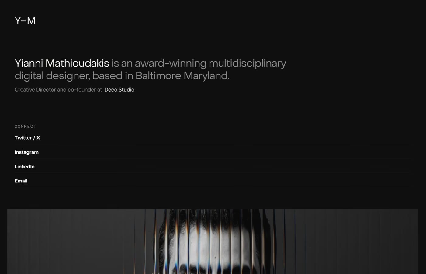 Yianni Mathioudakis — screenshot of a dark design portfolio site in black and white