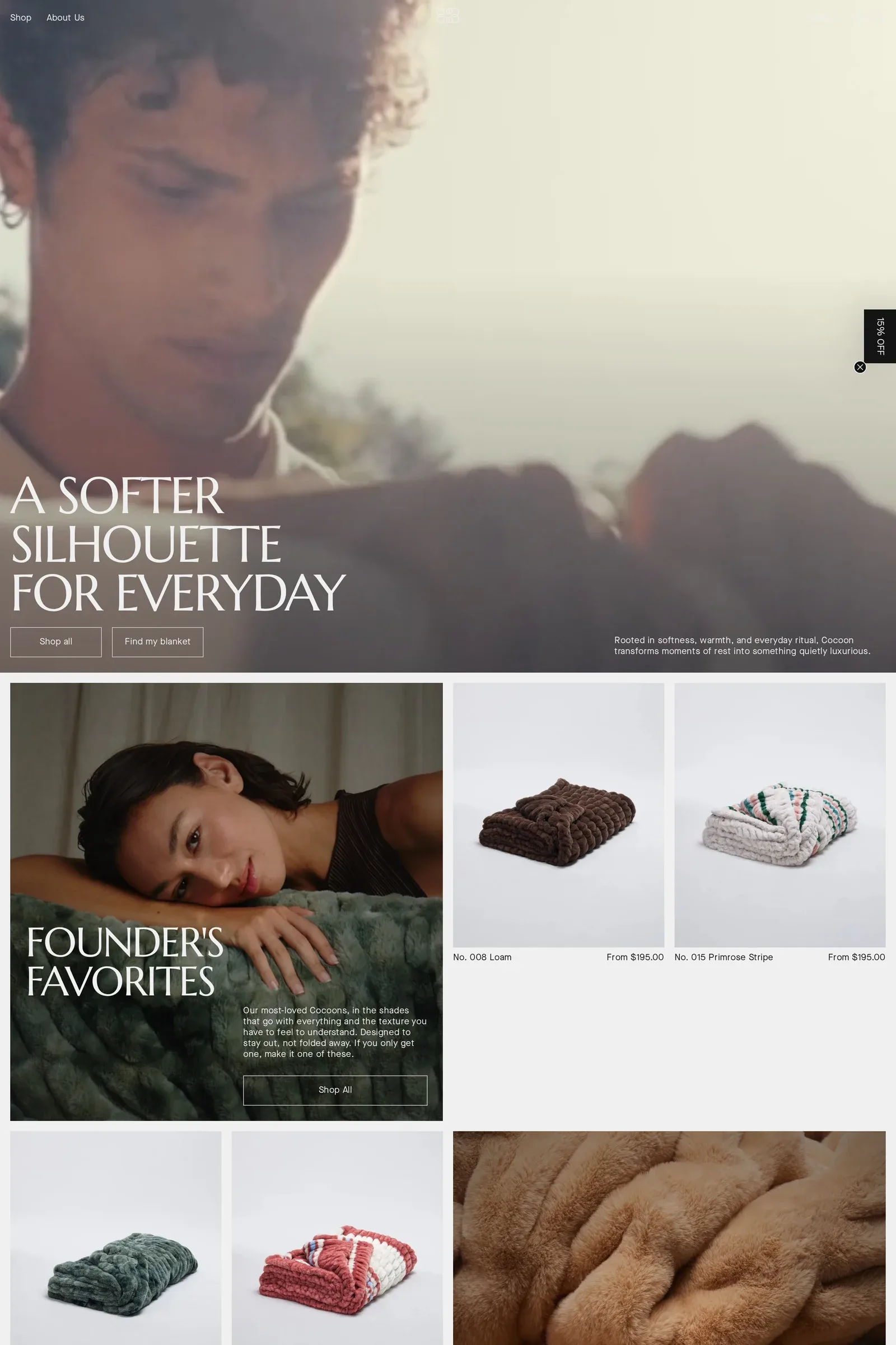CO'CŌŌN — screenshot of an elegant homeware online shop in white and black