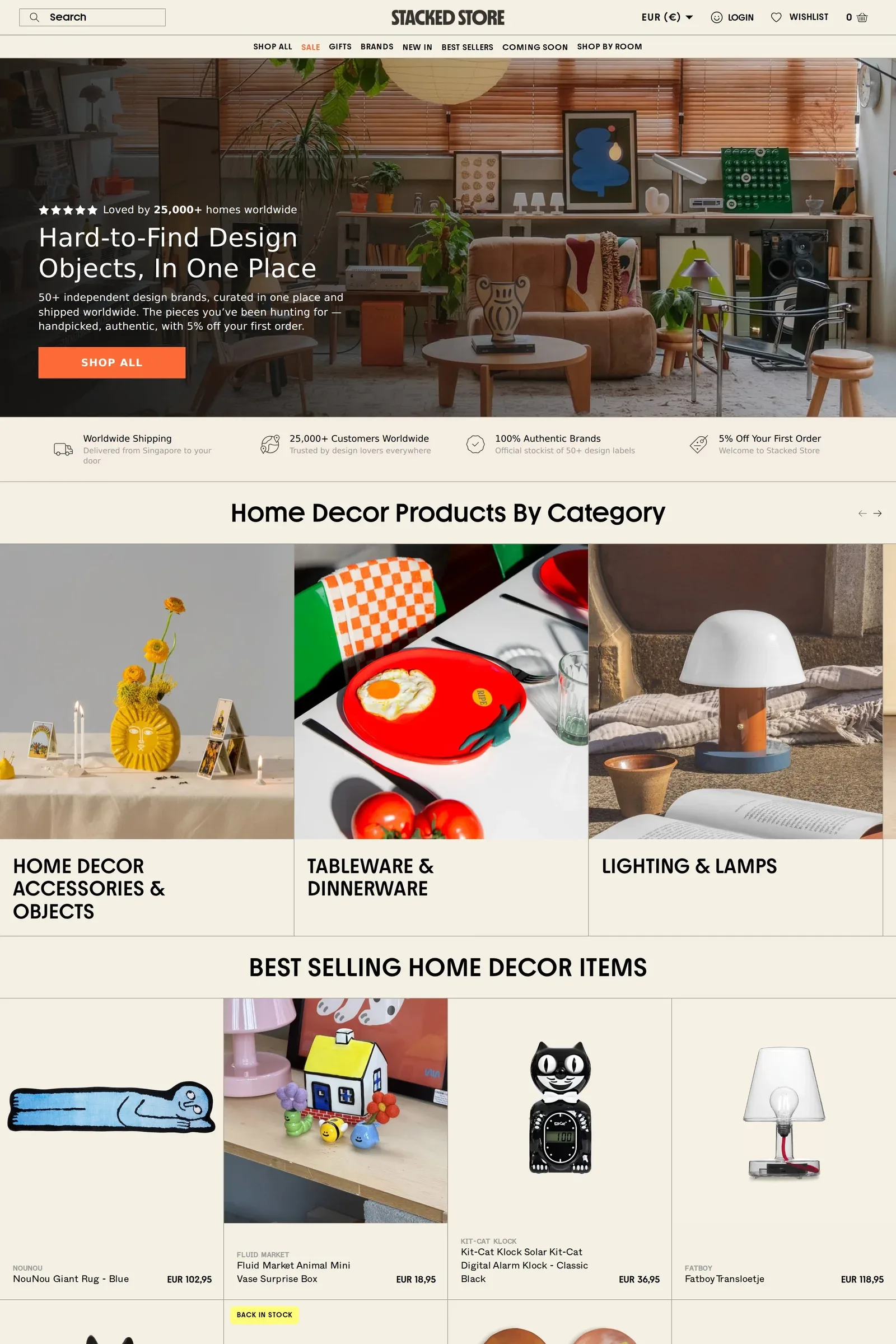 The Stacked Store — screenshot of a homeware online shop in yellow and dark green, with photography and outlined shapes
