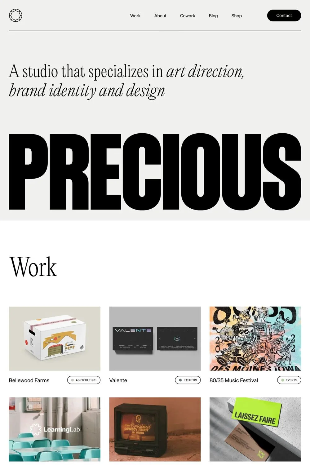 Precious — screenshot of a minimal design agency site in grey and white