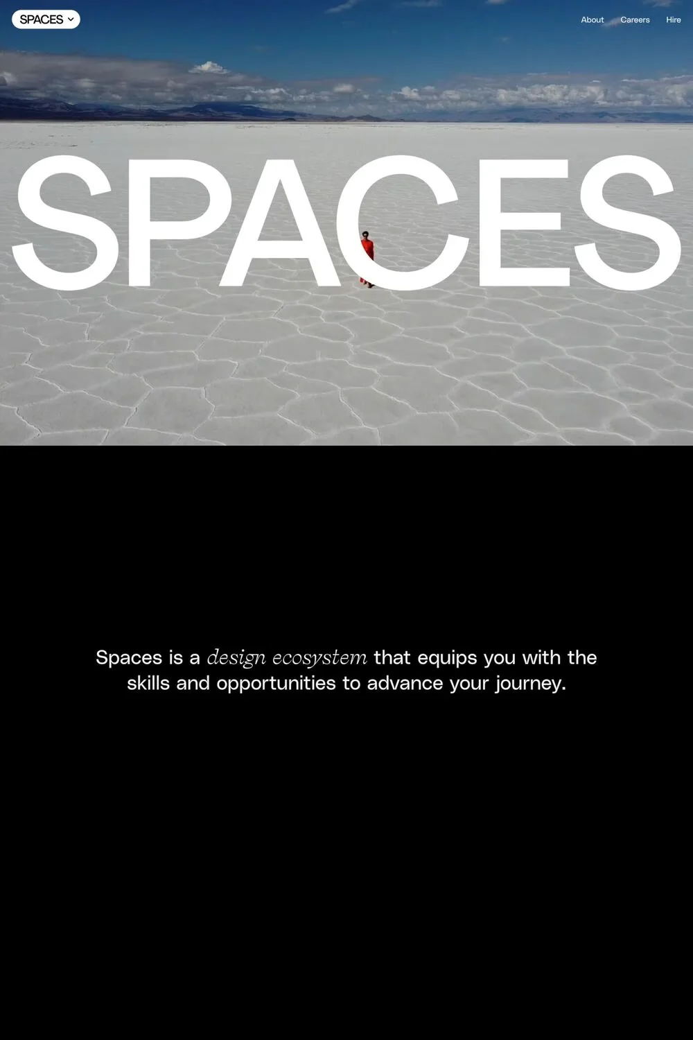 Spaces — screenshot of a typographic landing page in orange and black